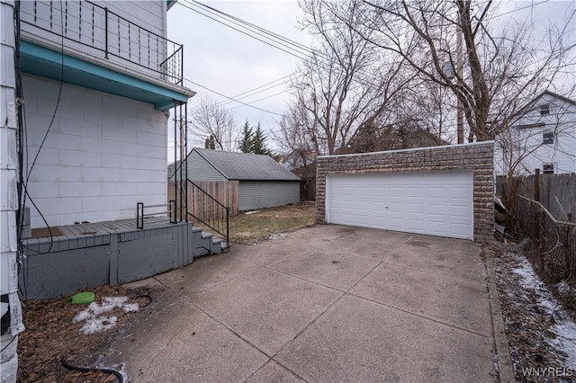 detached garage with fence