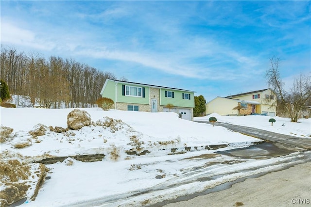 bi-level home with an attached garage