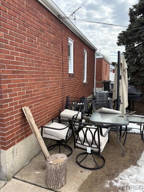 view of patio / terrace with central AC unit