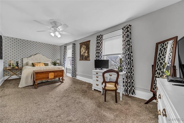 carpeted bedroom featuring a ceiling fan and baseboards