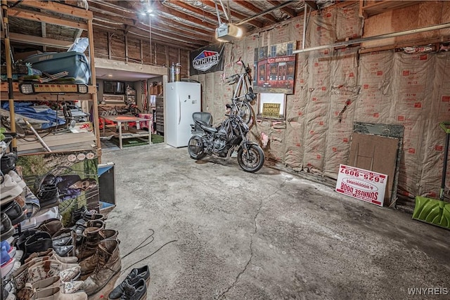 garage featuring freestanding refrigerator