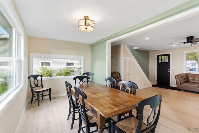 dining area with light wood finished floors, recessed lighting, and baseboards