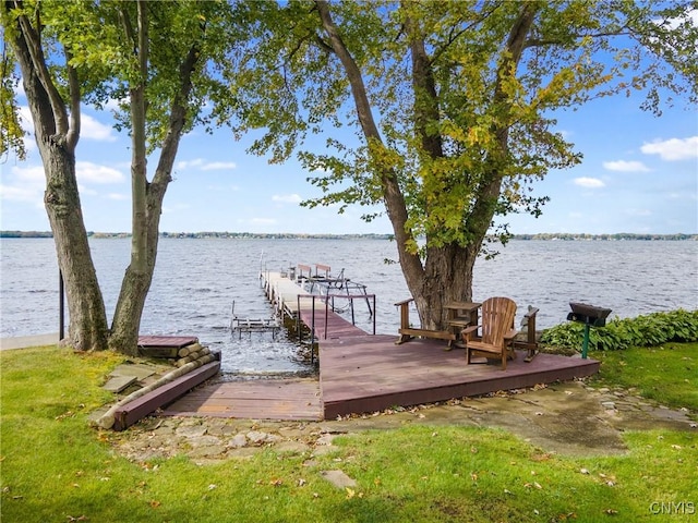 dock area featuring a water view