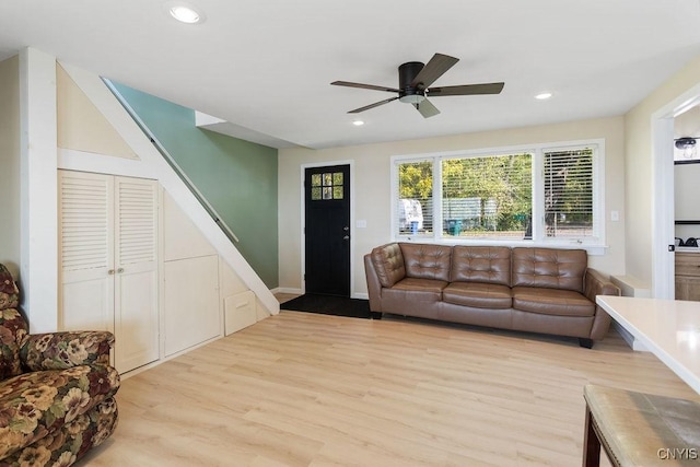 living room featuring recessed lighting, ceiling fan, and wood finished floors