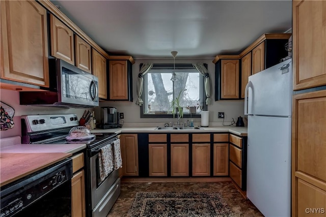 kitchen featuring stainless steel appliances, brown cabinetry, light countertops, and a sink