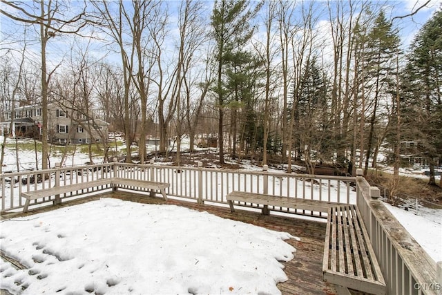 view of snow covered deck