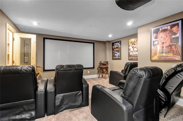 carpeted home theater room featuring baseboards and recessed lighting