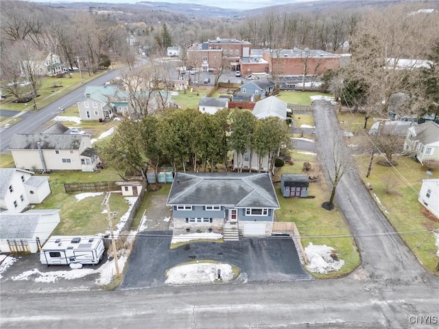 bird's eye view with a residential view and a view of trees