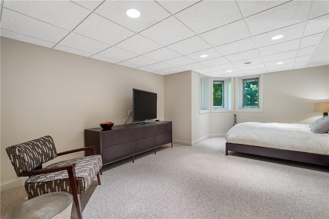 bedroom featuring carpet, a paneled ceiling, baseboards, and recessed lighting