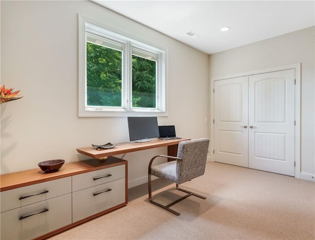 office space featuring recessed lighting, visible vents, and light colored carpet