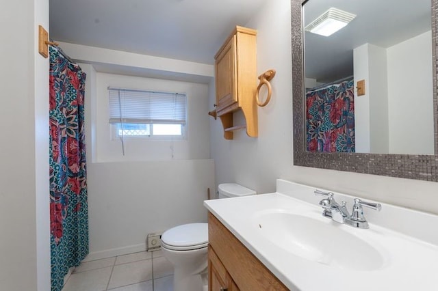 full bath with curtained shower, toilet, vanity, and tile patterned flooring