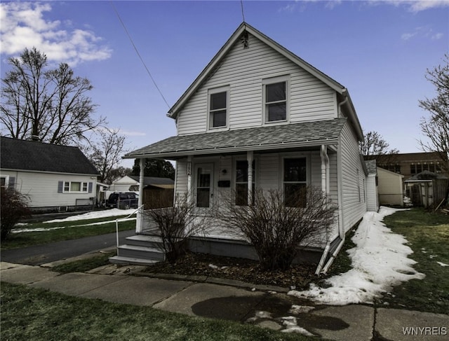 192 Cottage St, Lockport-City, NY 14094 - view of front of home with a porch and a shingled roof