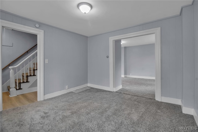 192 Cottage St, Lockport-City, NY 14094 - empty room with carpet flooring, baseboards, and stairs
