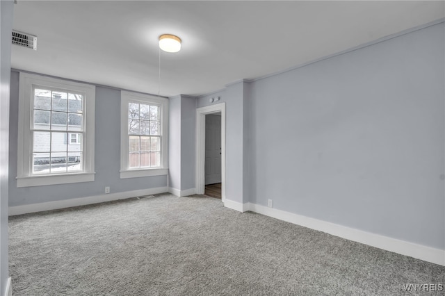 192 Cottage St, Lockport-City, NY 14094 - carpeted empty room with baseboards and visible vents