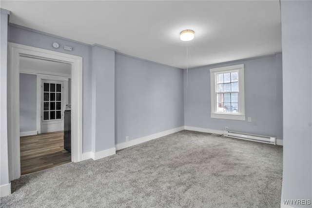 192 Cottage St, Lockport-City, NY 14094 - carpeted spare room with baseboards, baseboard heating, and crown molding