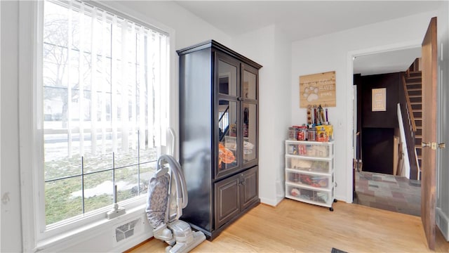 interior space featuring visible vents and light wood finished floors