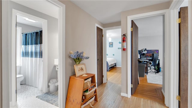 hall featuring light wood-style floors