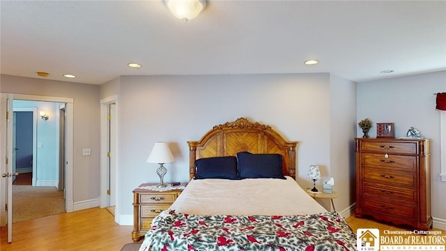 bedroom with light wood-type flooring, recessed lighting, and baseboards