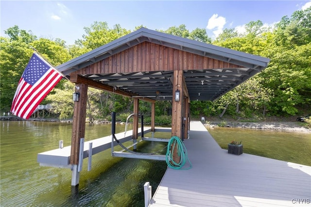 dock area with a water view