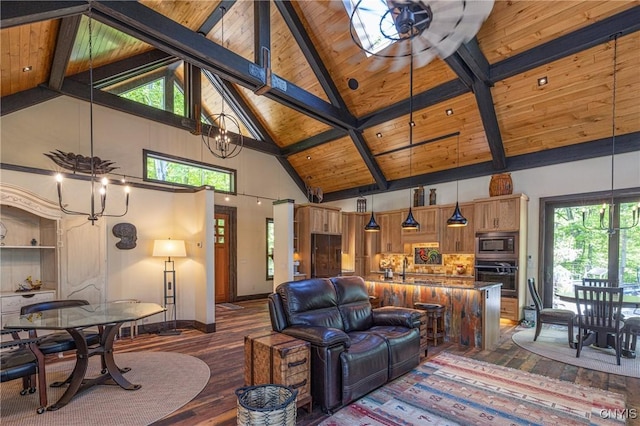 living room featuring a chandelier, wood ceiling, beamed ceiling, and wood finished floors