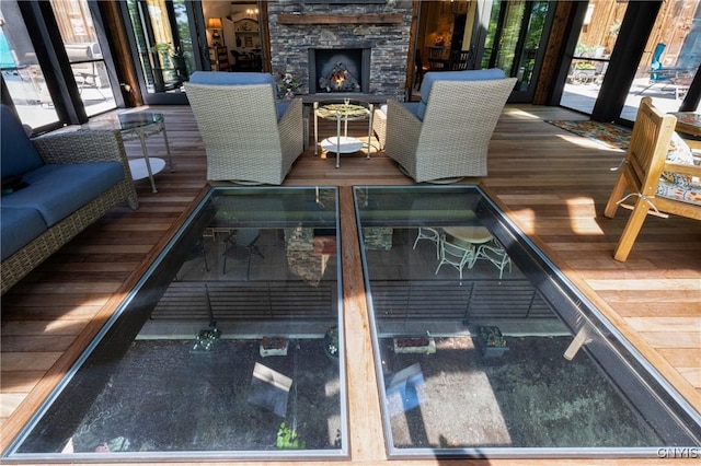 interior space featuring a stone fireplace