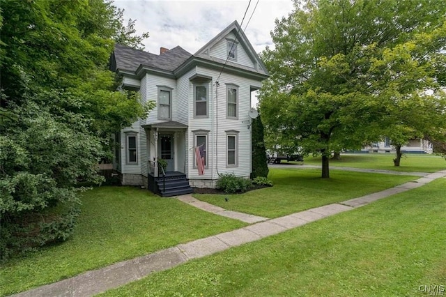 view of front of house with a front lawn