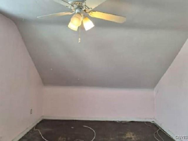 additional living space with ceiling fan