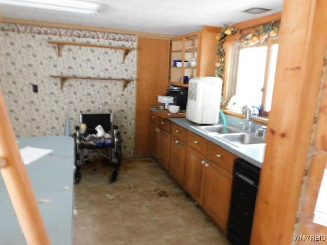 kitchen featuring brown cabinets, dishwasher, a sink, and open shelves