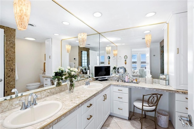 full bath with tile patterned flooring, a sink, toilet, and recessed lighting