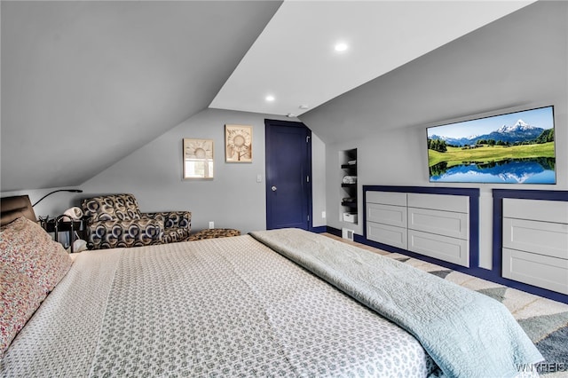 bedroom featuring vaulted ceiling and recessed lighting