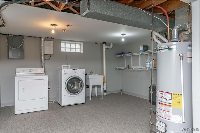 laundry area with carpet floors, laundry area, water heater, and washing machine and clothes dryer