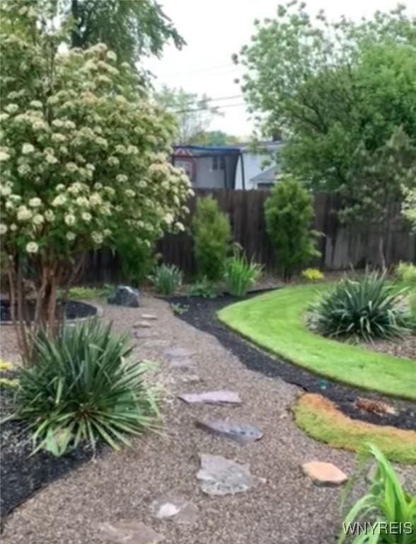 view of yard with fence