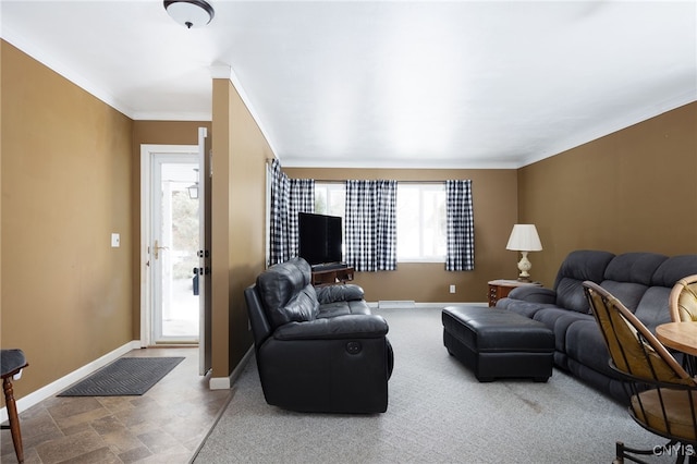 living room with baseboards and ornamental molding