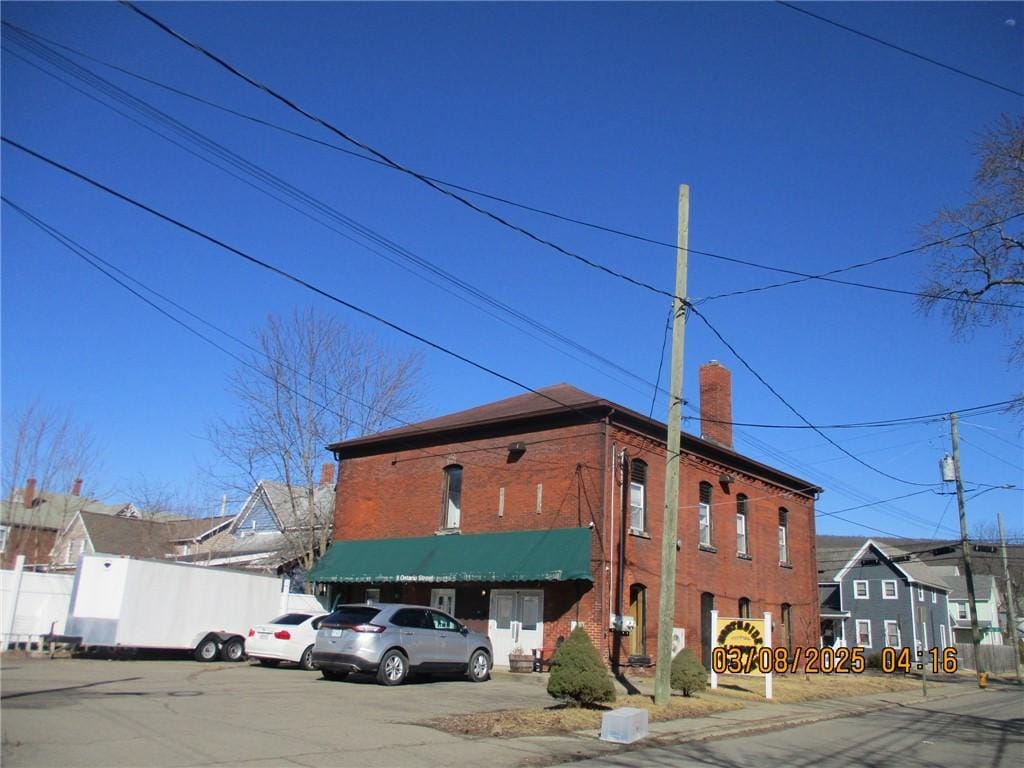 view of property featuring fence