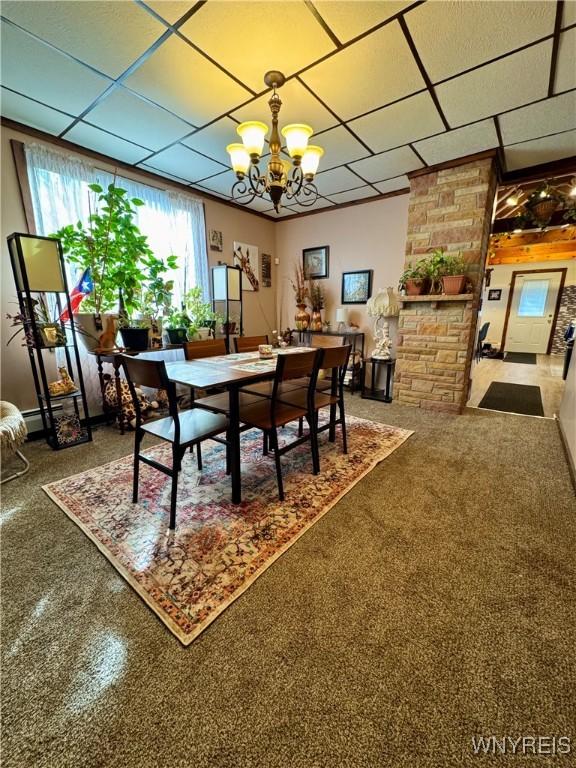 1258 W Ave, Buffalo, NY 14213 - dining space featuring a chandelier, a drop ceiling, and carpet flooring