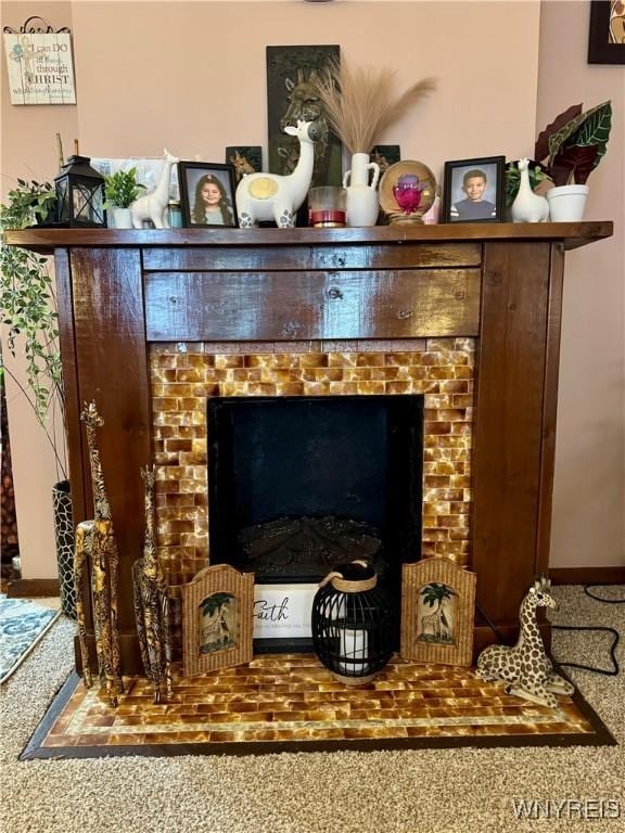1258 W Ave, Buffalo, NY 14213 - detailed view of a brick fireplace and carpet flooring