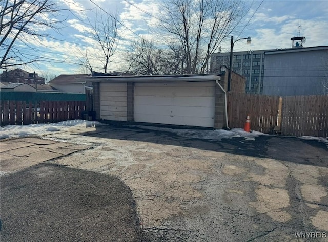 detached garage with fence