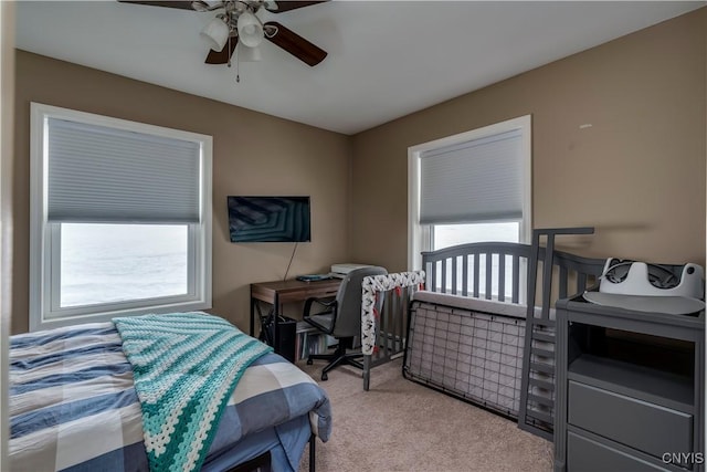 bedroom featuring carpet and ceiling fan