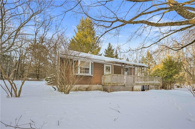 view of front of property with a deck