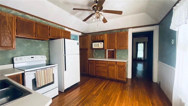 kitchen featuring white appliances, dark wood-style floors, brown cabinets, and light countertops