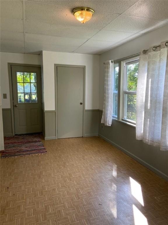 entryway with wainscoting