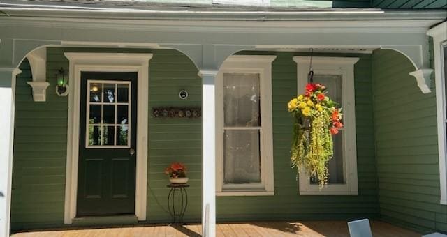 property entrance with a porch