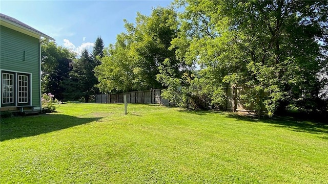 view of yard featuring fence