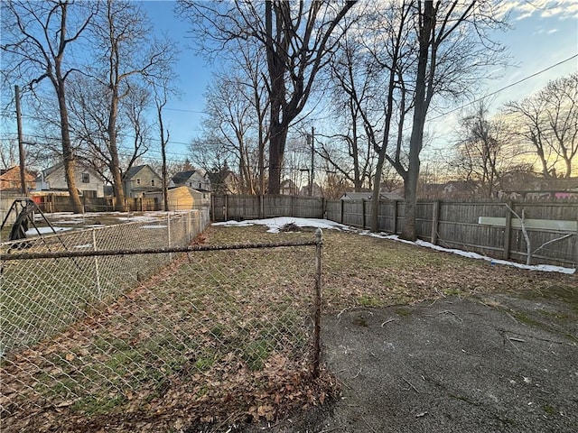 view of yard featuring a fenced backyard