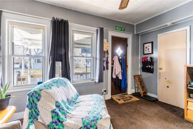 sitting room with carpet floors and ceiling fan