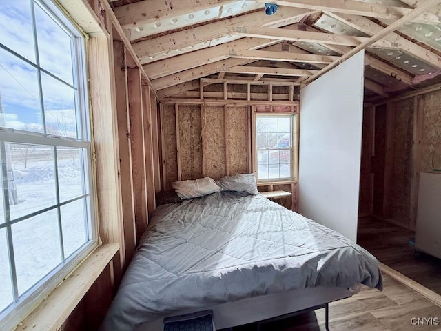 bedroom with wood finished floors