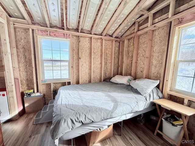 bedroom featuring wood finished floors