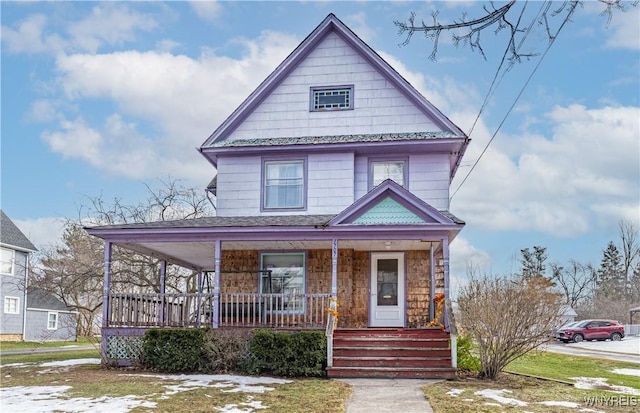 victorian-style house with covered porch