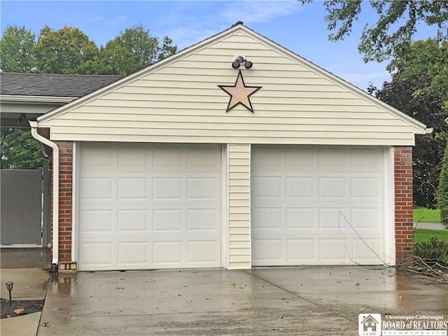 garage featuring driveway