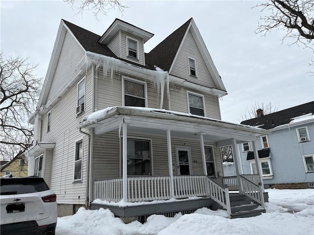 traditional style home featuring a porch